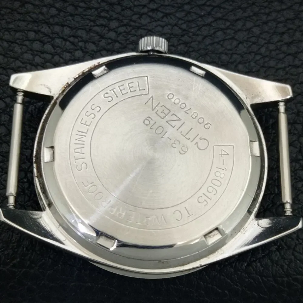 Vintage 1981 Citizen Manual Wound Mens Silver Watch W/Date & Teal accents
